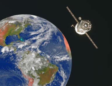 Satellite orbiting the earth in space.