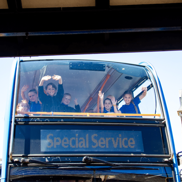 Pupils on the top of a Stagecoach East double decker bus